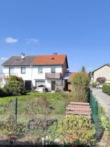 R�ckansicht mit Garten Charmantes, einseitig angebautes Einfamilienhaus in bevorzugter Lage von Riegelsberg!