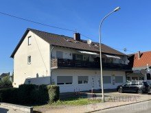 Front- und Seitenansicht Attraktive Rendite!  Gepflegtes Wohn- und Gesch�ftshaus in zentraler Lage von Rehlingen-Siersburg!