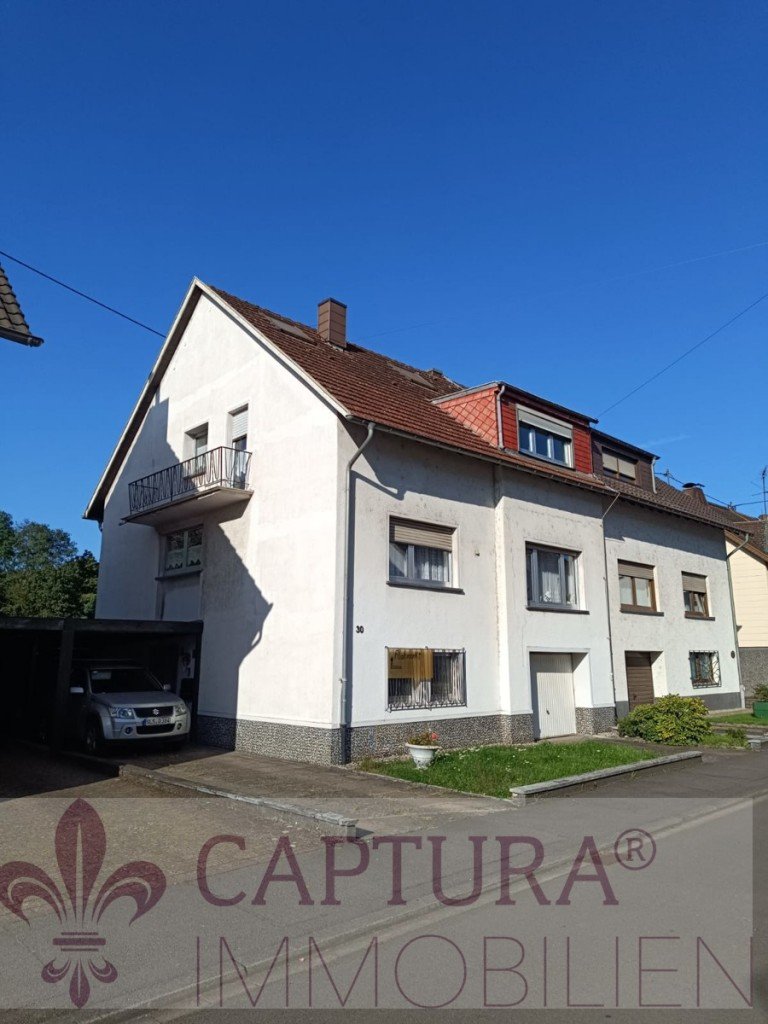 Vorderansicht Dillingen / Diefflen Einfamilienhaus Tolles Ein- bis Zweifamilienhaus mit gro�em Garten!