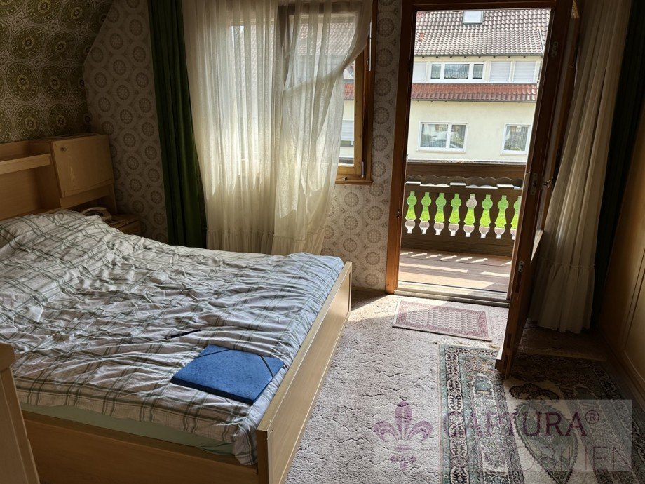 Schlafzimmer mit Balkon Einfamilienhaus Mandelbachtal