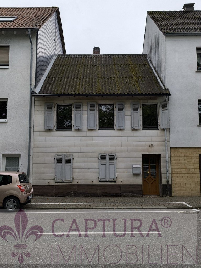 Frontansicht St. Ingbert Reihenmittelhaus Einfamilienhaus mit Potenzial - perfekte Gelegenheit f�r kreative K�pfe und Investoren!
